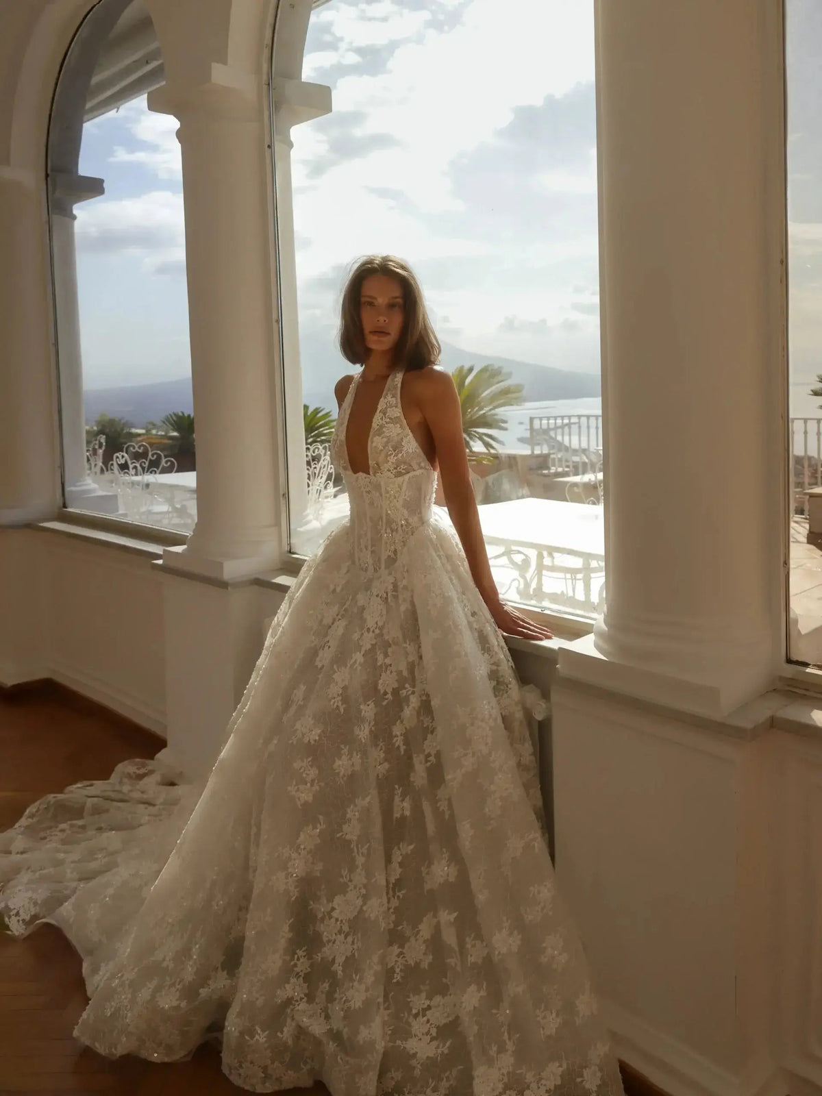 Modern Ivory Lace Deep V-Neck Halter Ball Gown Wedding Dress with Train SW185