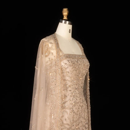 Elegant Champagne Beaded Evening Gown with Sheer Cape SS393