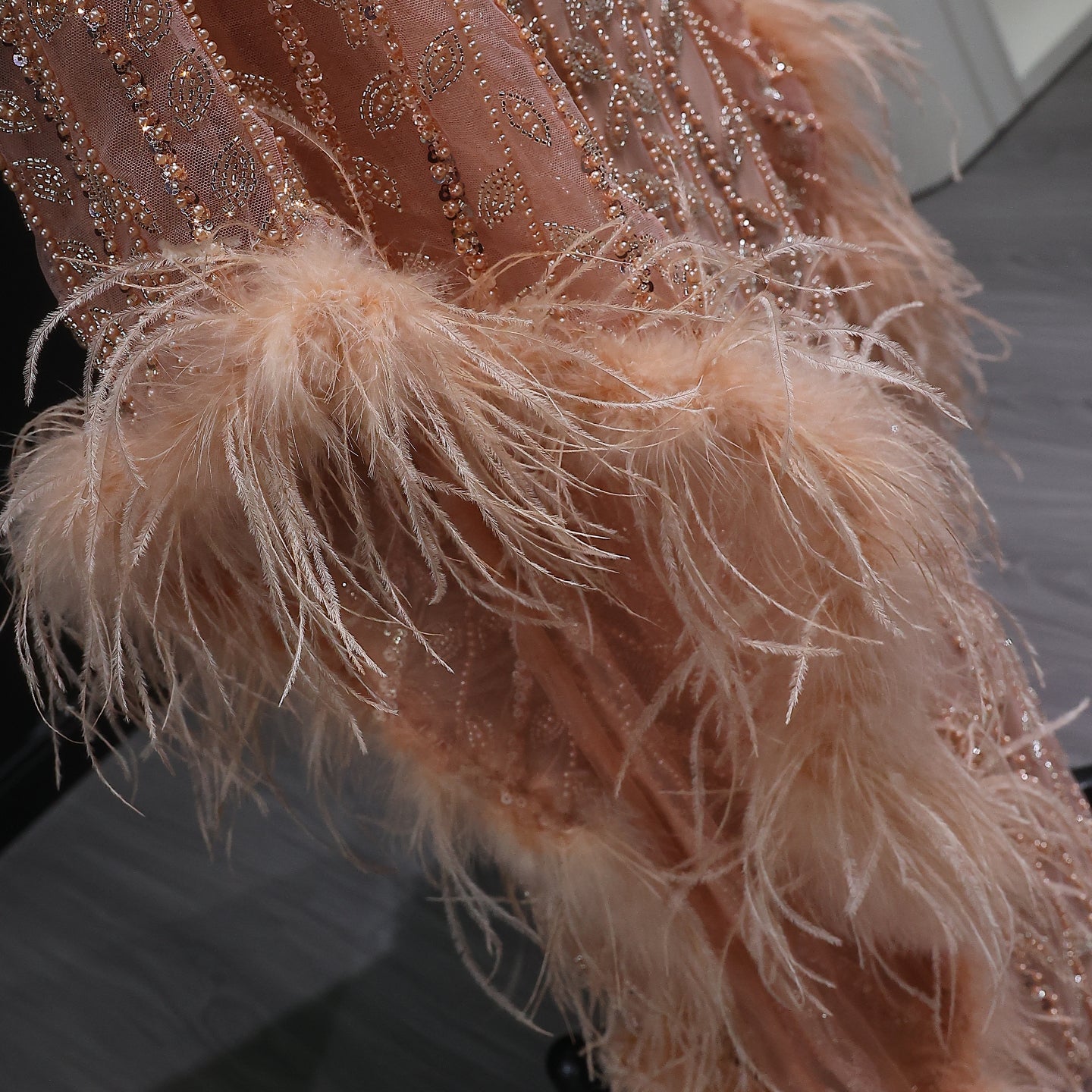 Elegant Rose Gold Evening Gown with Feathered Cape Sleeves SS788